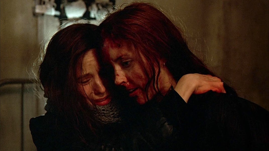 Emily Perkins and Katherine Isabelle in GINGER SNAPS (2000)