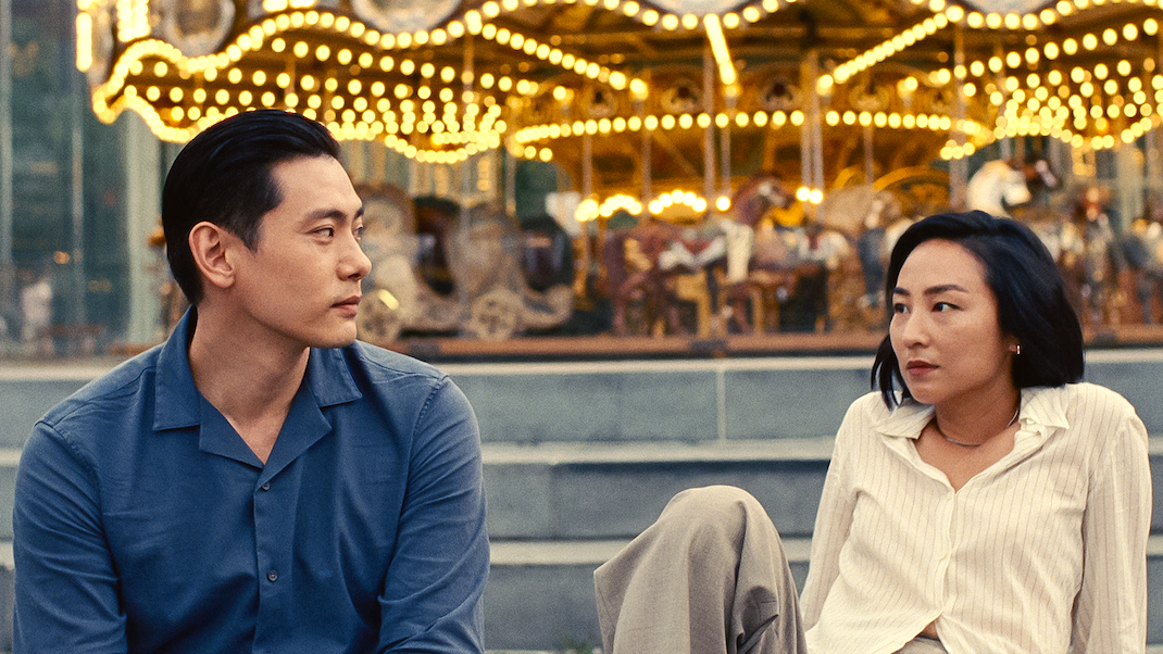 Teo Yoo and Greta Lee in PAST LIVES.