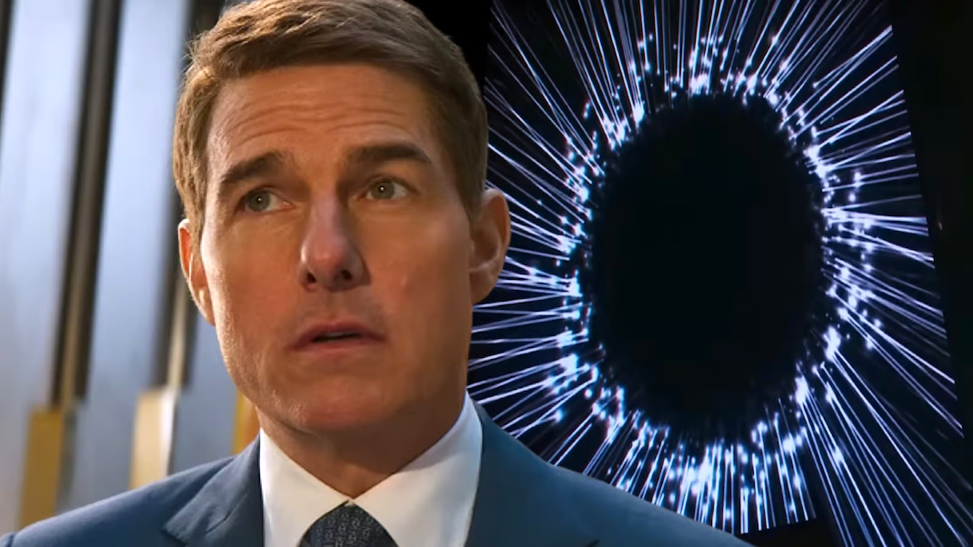 Ethan Hunt (Tom Cruise) stands in front of a large computer screen showing "The Entity" (represented as a bunch of glowing white lines meeting in a circle that looks like the iris of an eye).